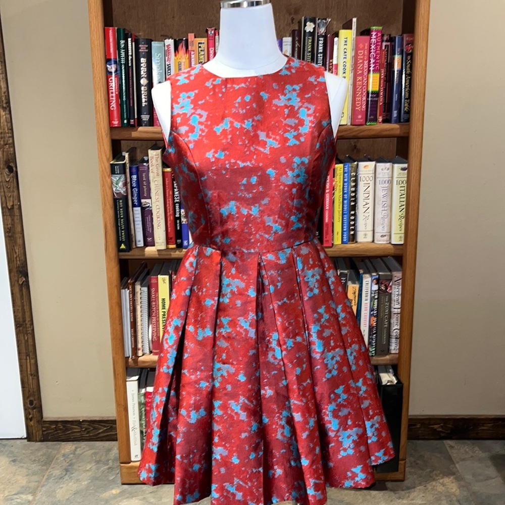 Red brocade pleated dress
